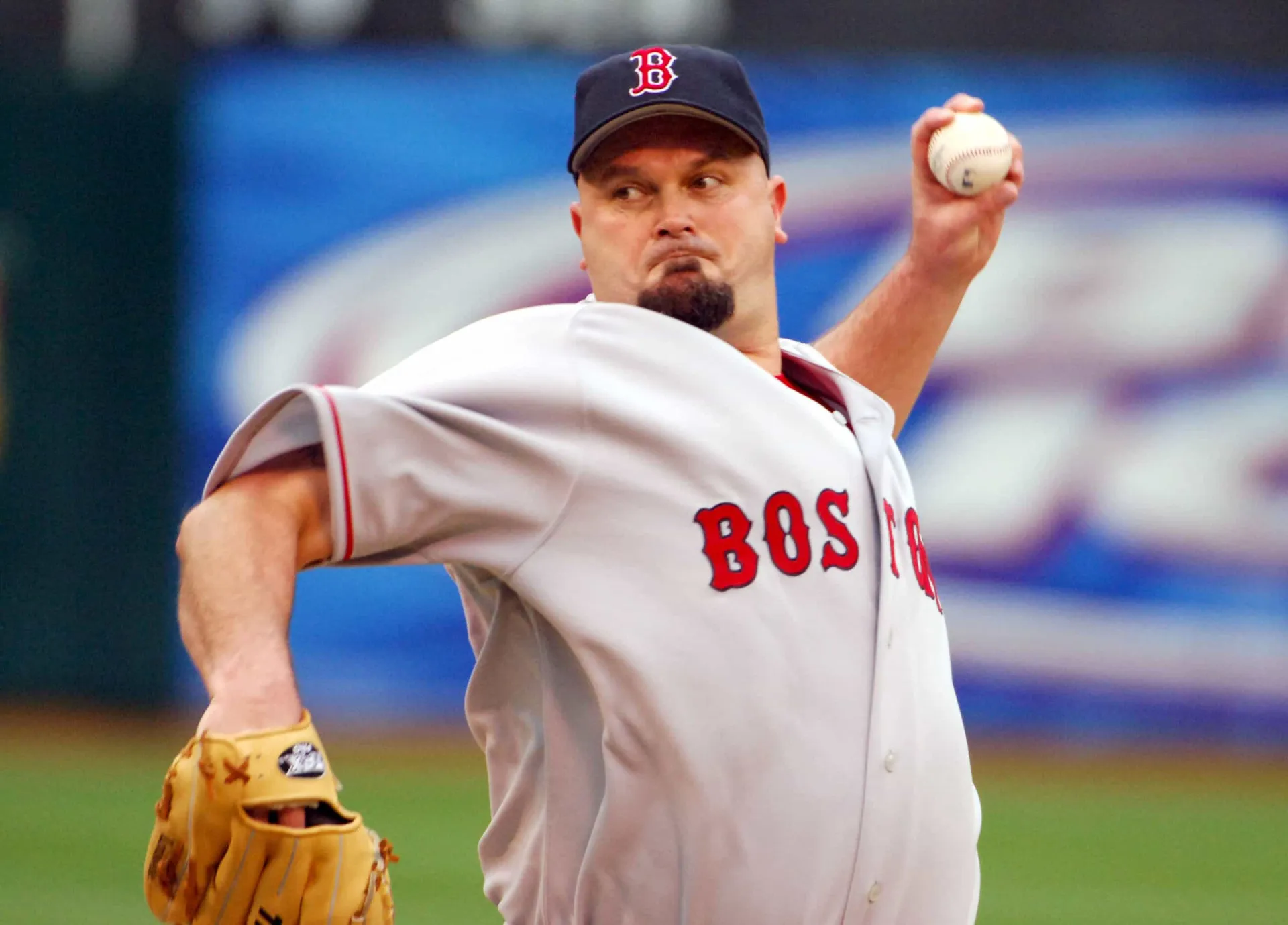 O arremessador de beisebol David Wells em ação no montinho.