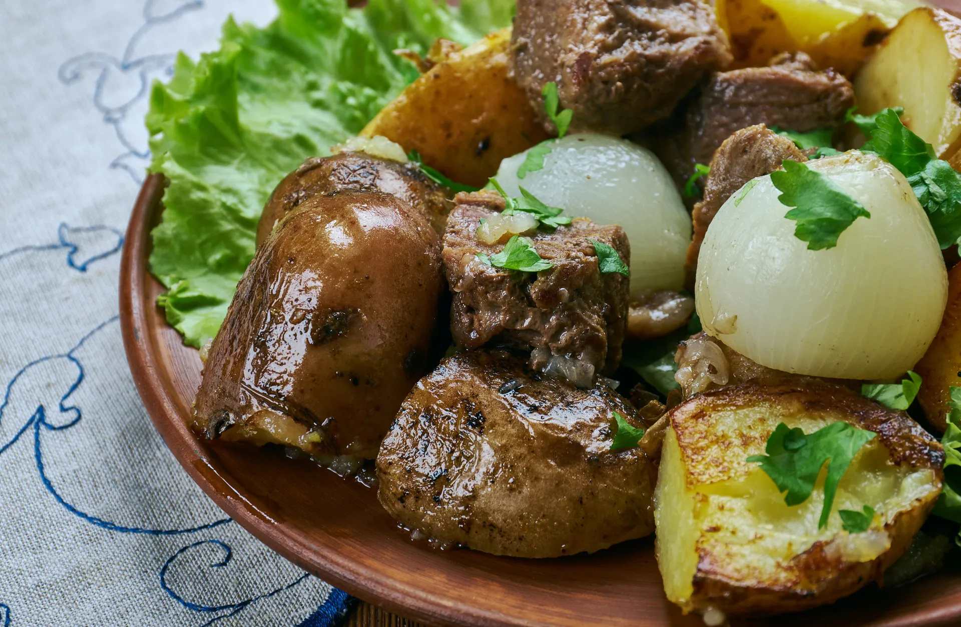 Prato português de carne de vinha-d'alhos, o ancestral direto do Vindalho.