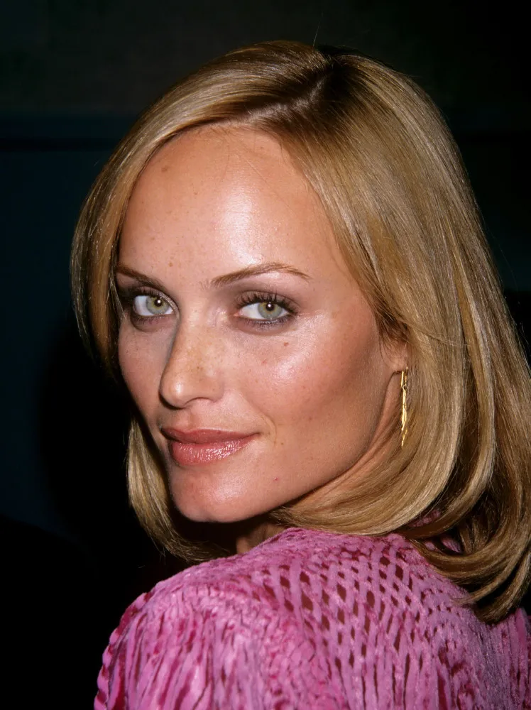 A modelo Amber Valletta, que teria sido descoberta por DiCaprio em uma revista.