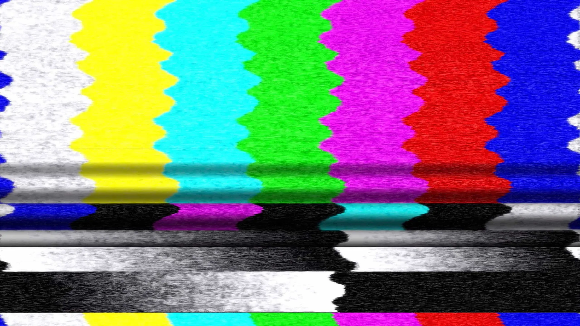 Uma televisão antiga com a tela chuviscando e com interferência.