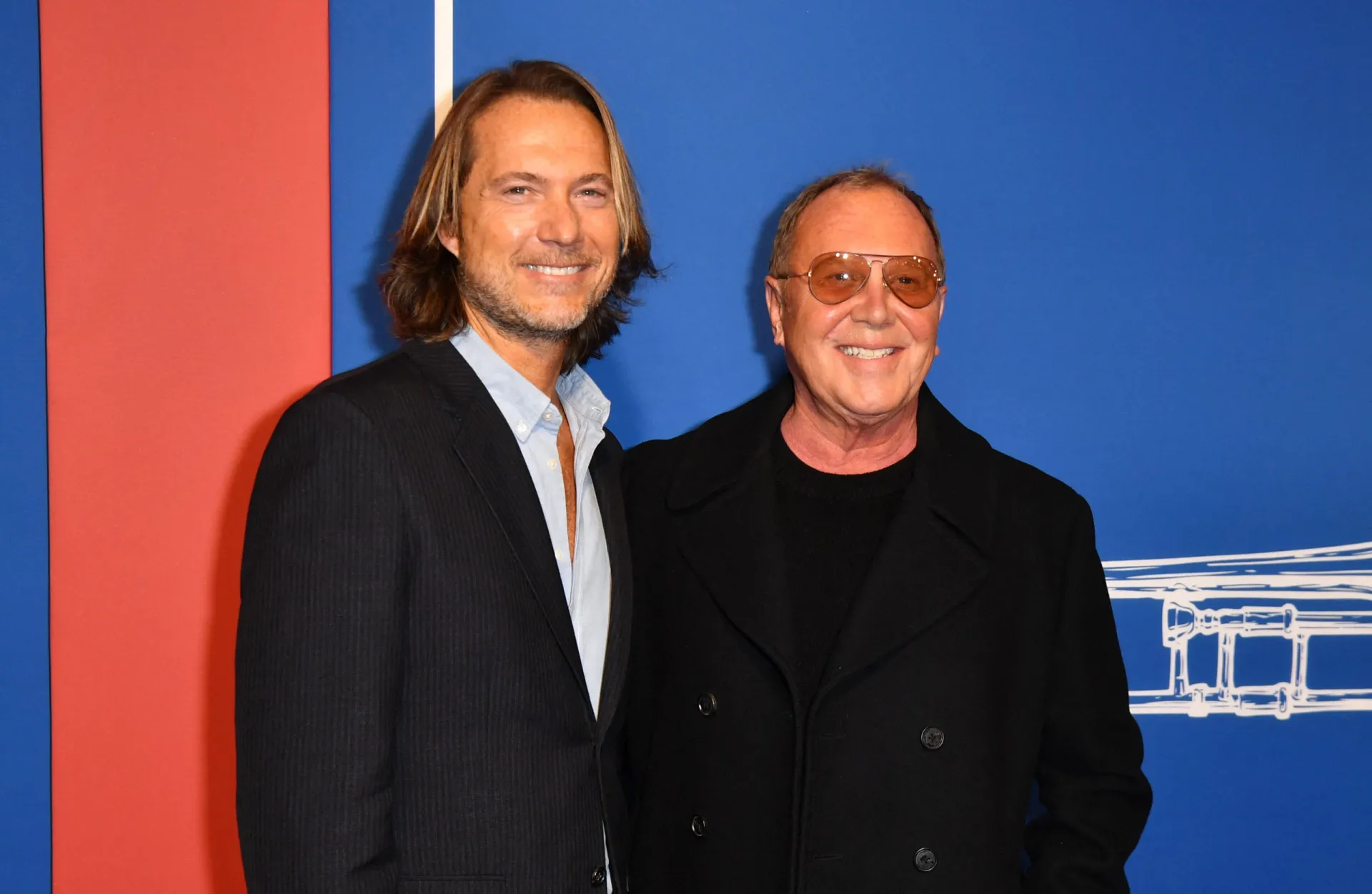 O estilista Michael Kors e seu marido Lance LePere, que se conheceram em 1990.