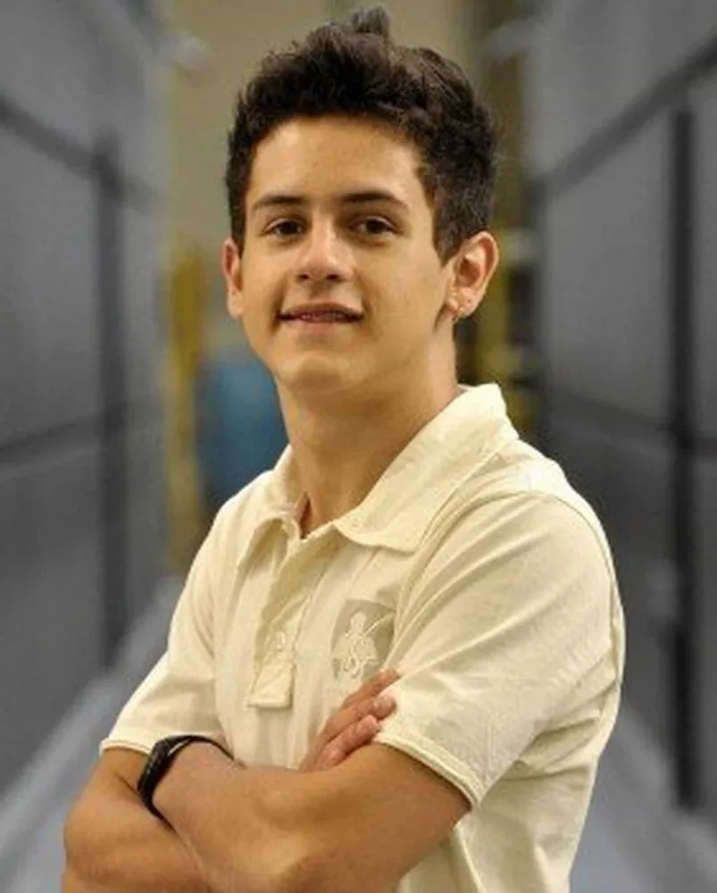 O ator David Lucas em uma foto da época em que era ator mirim na Globo.