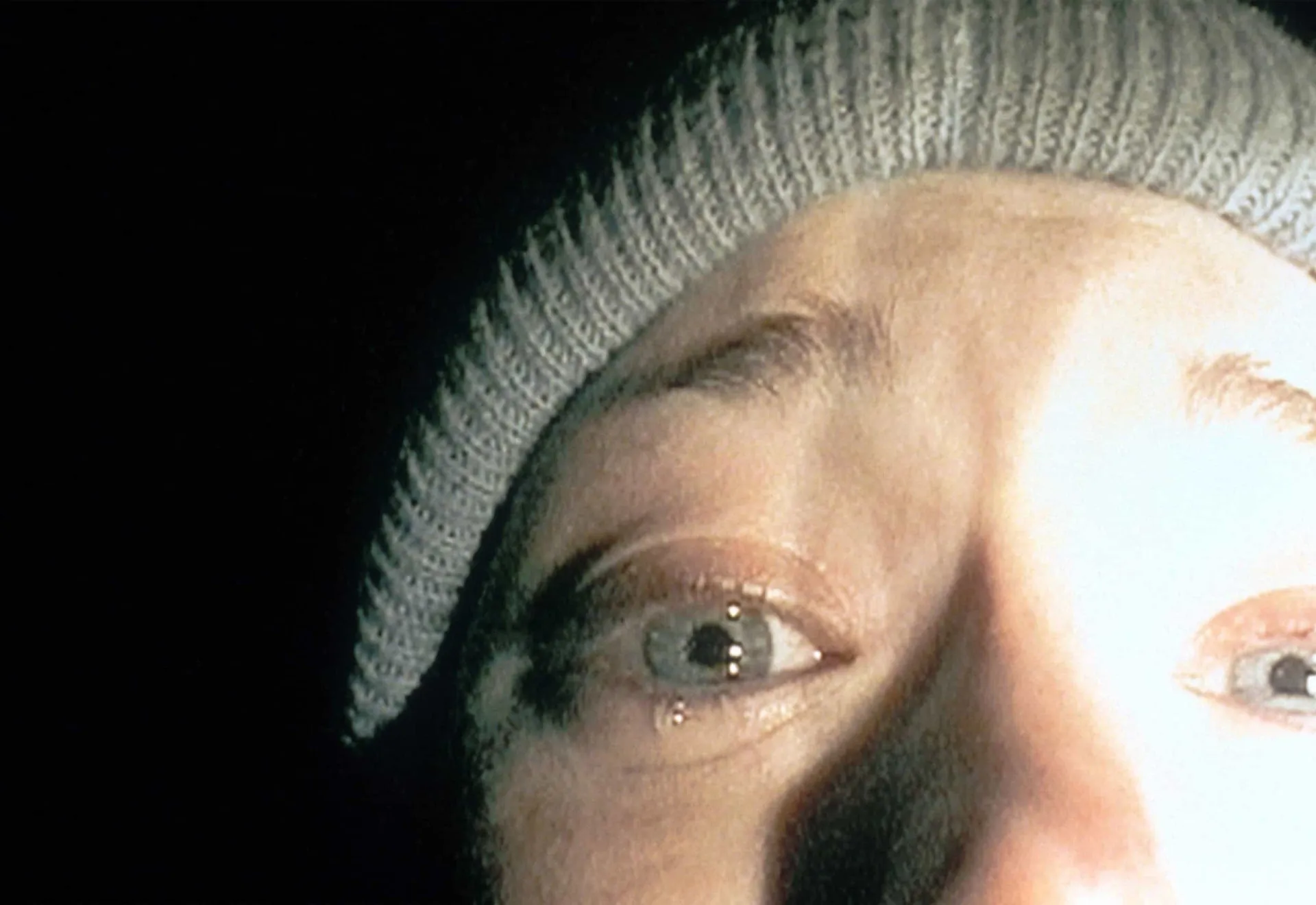 Uma das cenas mais famosas de 'A Bruxa de Blair', com a personagem Heather em close-up chorando.