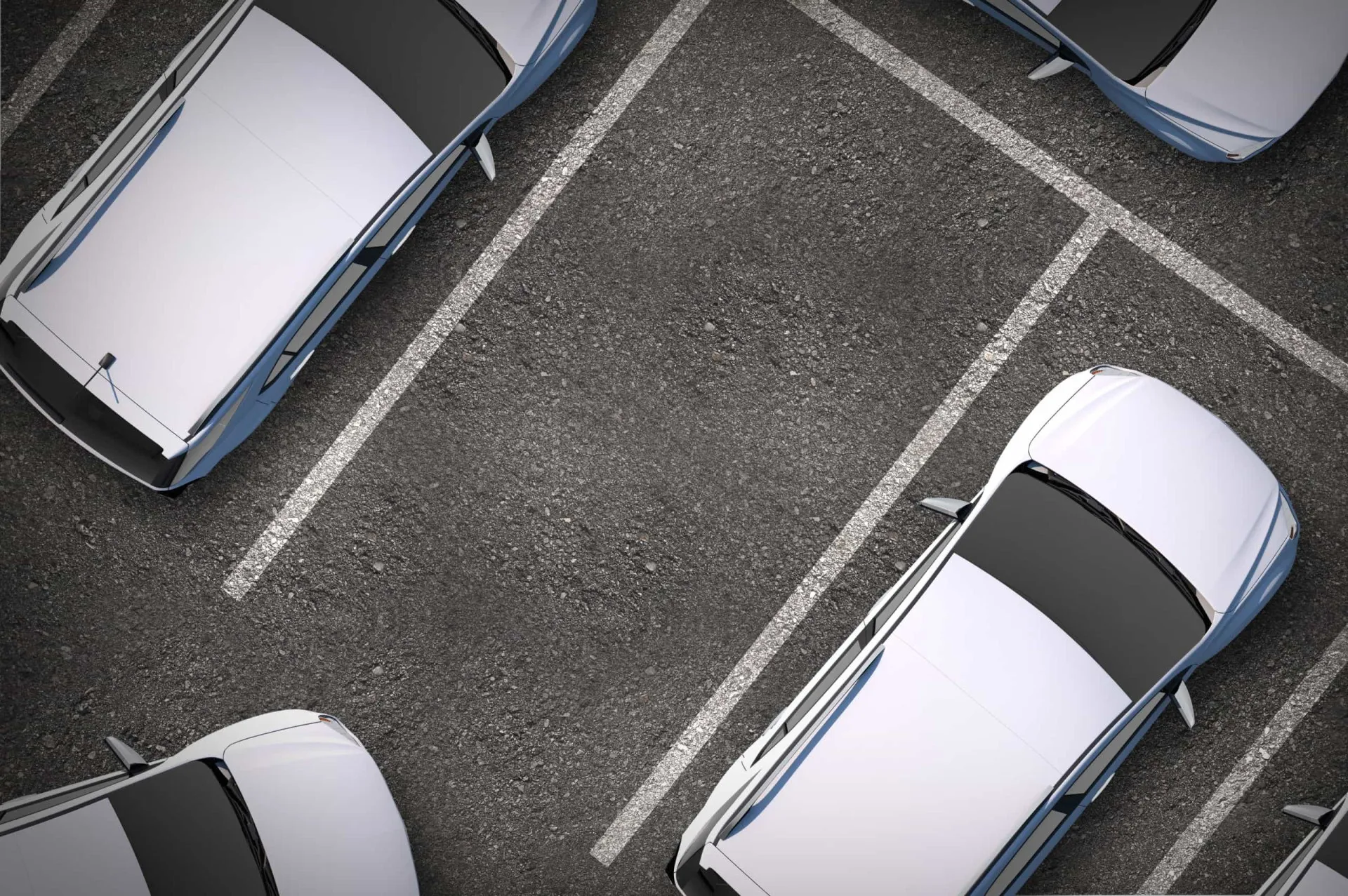 Um carro estacionando perfeitamente em uma vaga livre bem na frente de um prédio.