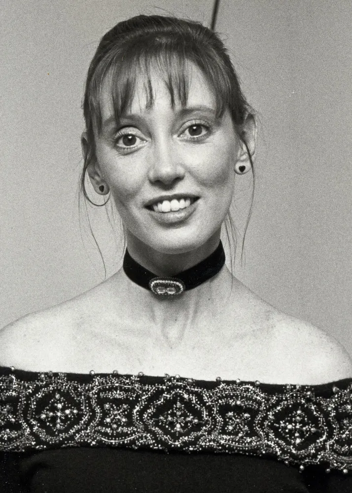 A atriz Shelley Duvall, com seu visual único e marcante.