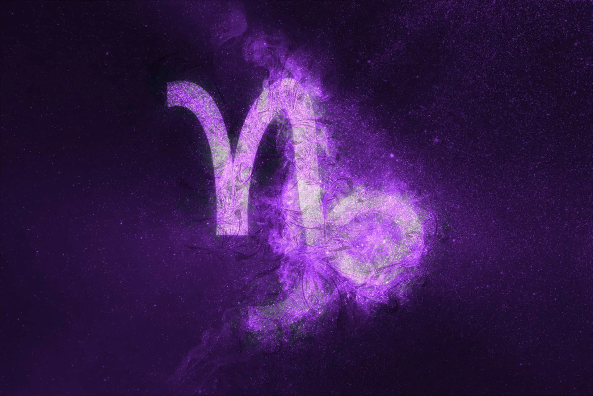 O símbolo do signo de Capricórnio, a cabra do mar, em um fundo de montanhas e estrelas.
