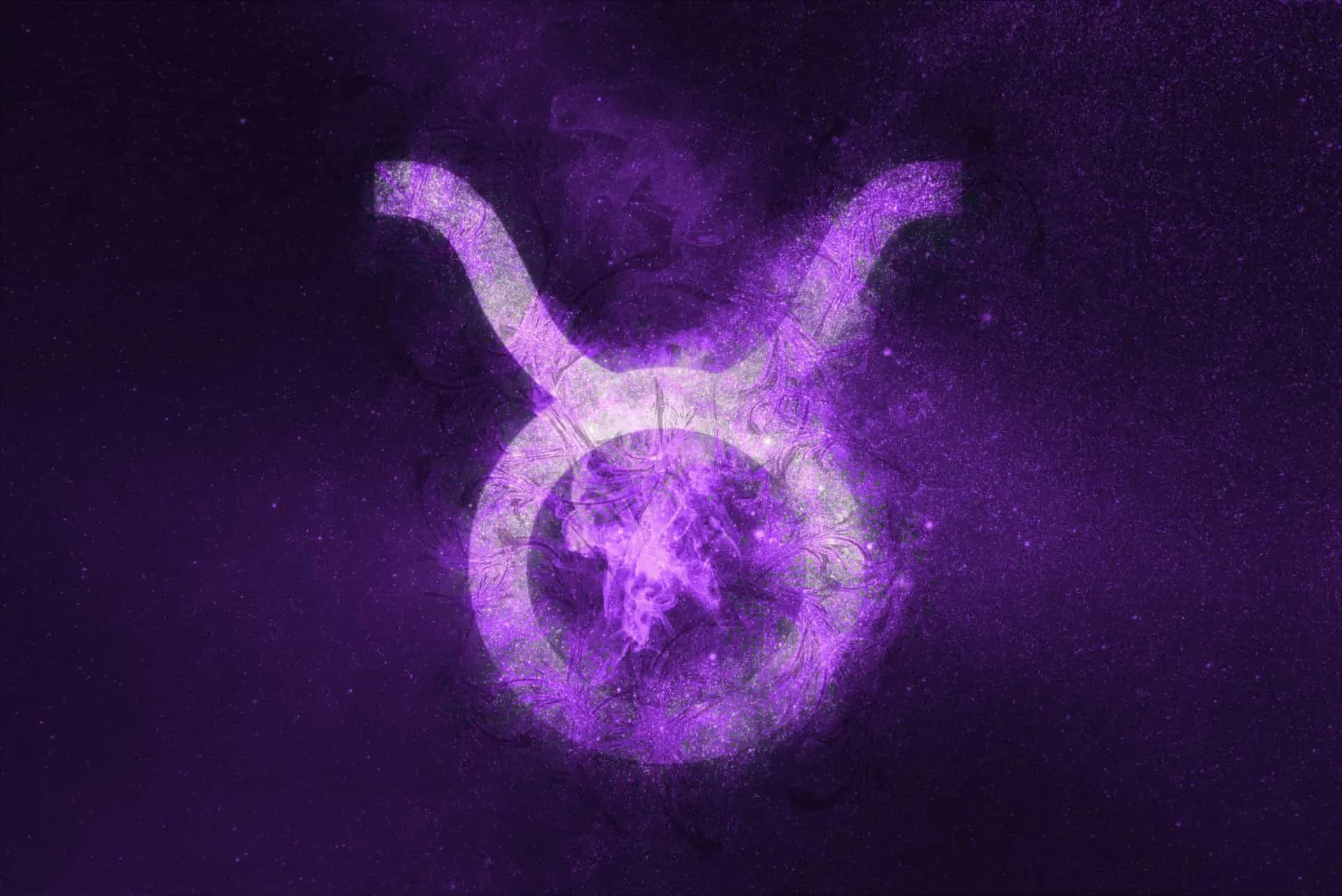 O símbolo do signo de Touro, o touro, em um fundo astrológico robusto.