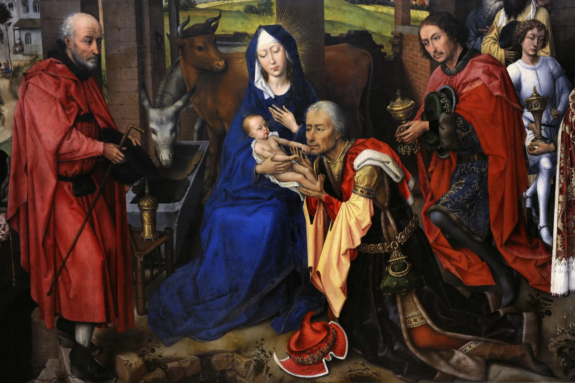 Representação dos Magos oferecendo seus presentes ao menino Jesus.