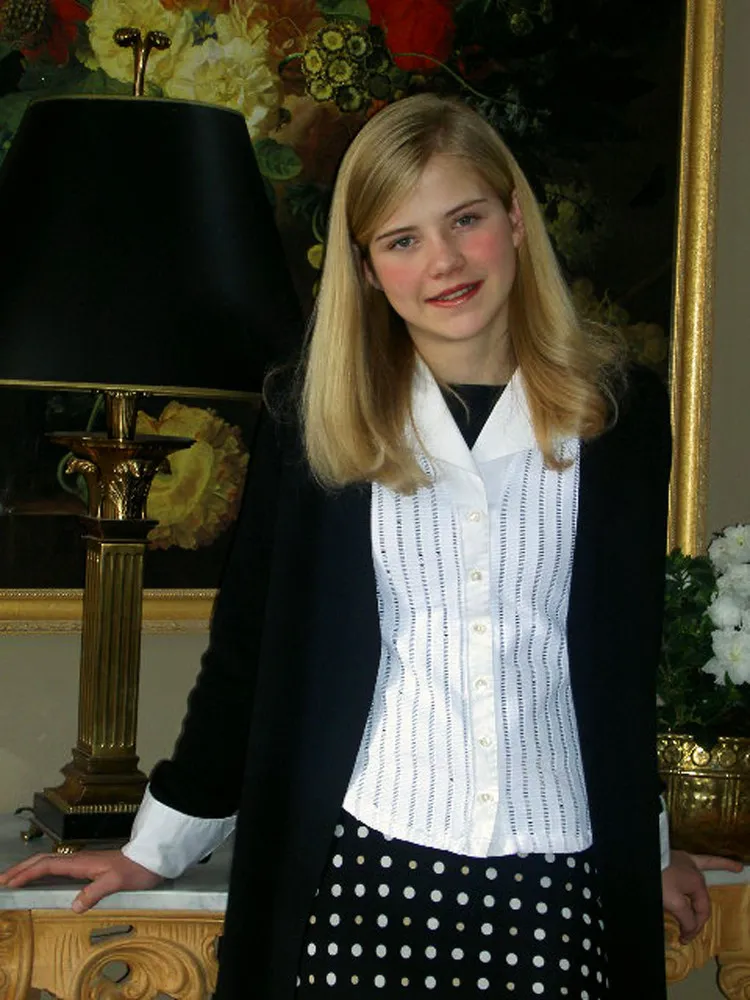 Elizabeth Smart falando em um evento como ativista, usando sua experiência para ajudar outras vítimas.