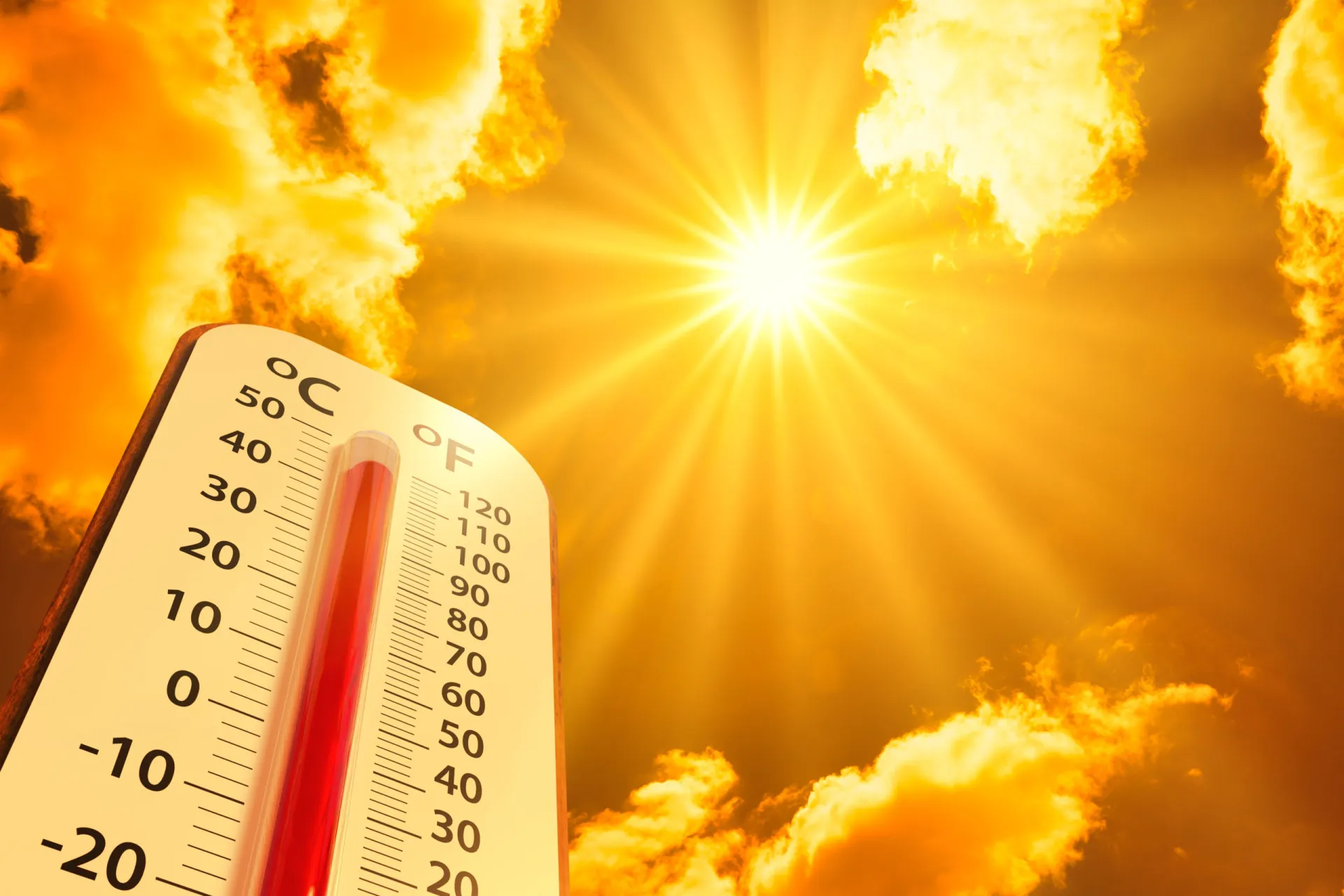 Um termômetro marcando alta temperatura com um fundo vermelho e quente, simbolizando o aquecimento global.
