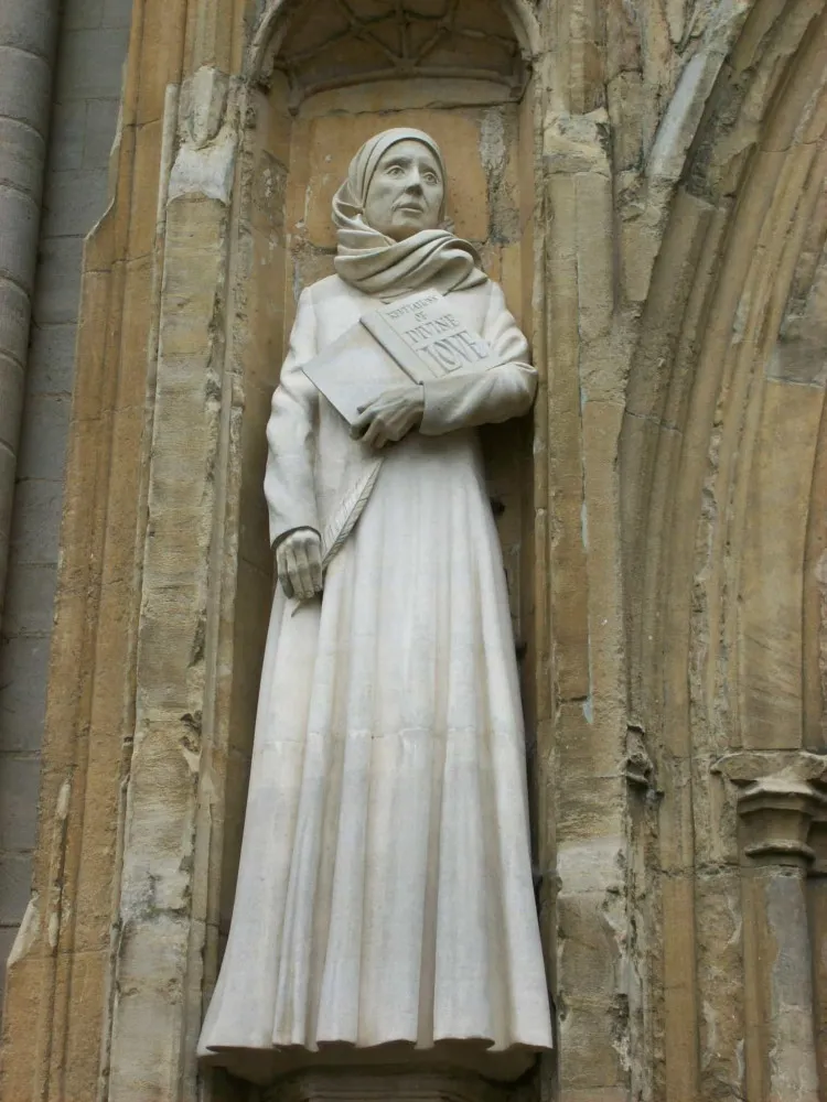 Representação artística de Juliana de Norwich recebendo uma visão divina em sua cela.